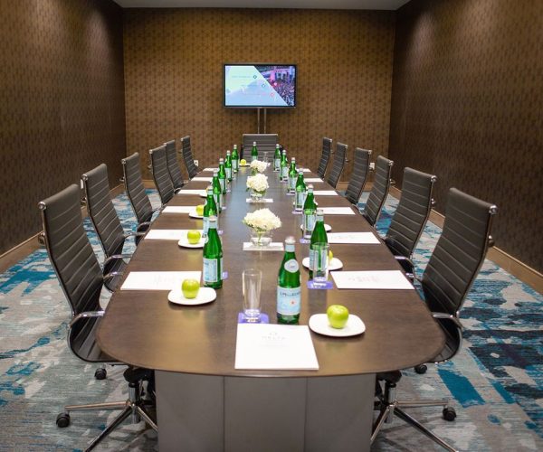 conference room table and water bottles